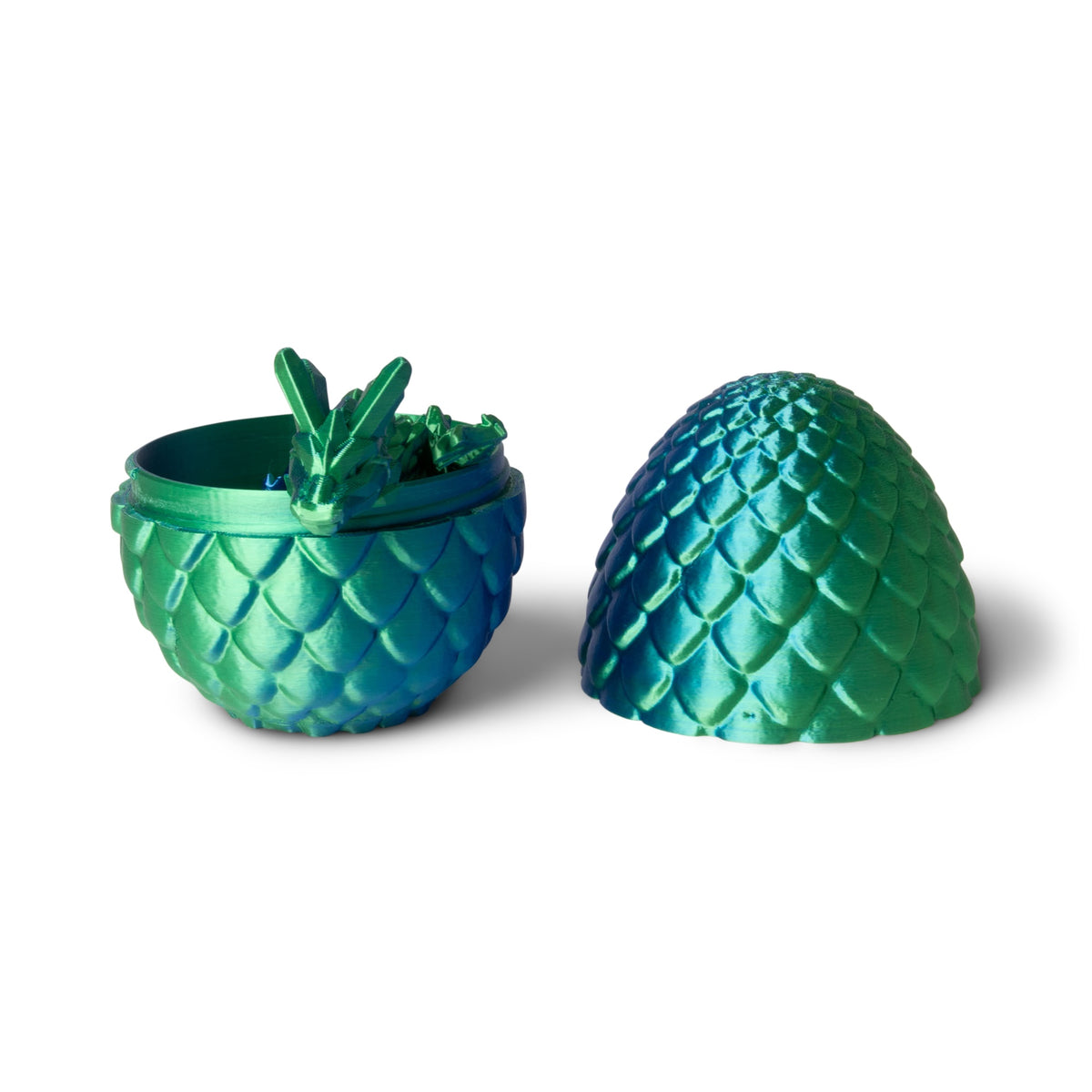 Giant Green/Blue dragon egg split open revealing the articulated dragon curled inside