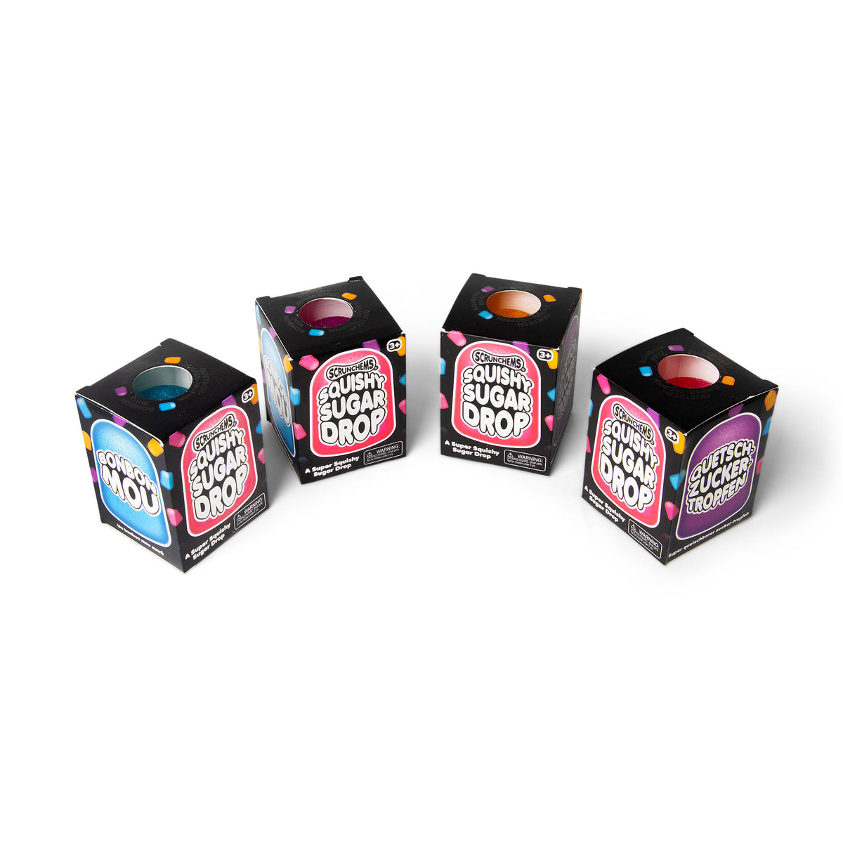 Four Squishy Sugar Drop boxes lined up showing different colors through the top window