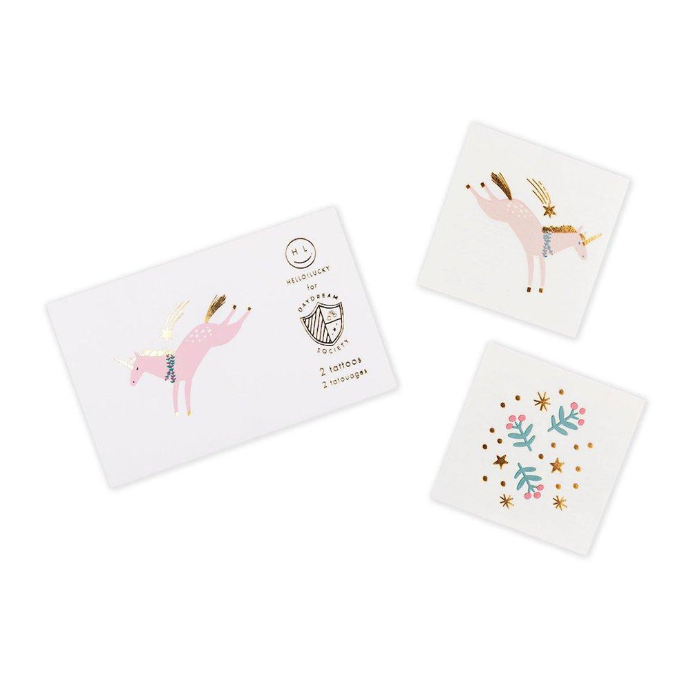 Pack of two Magical Christmas unicorn temporary tattoos with gold foil by Daydream Society