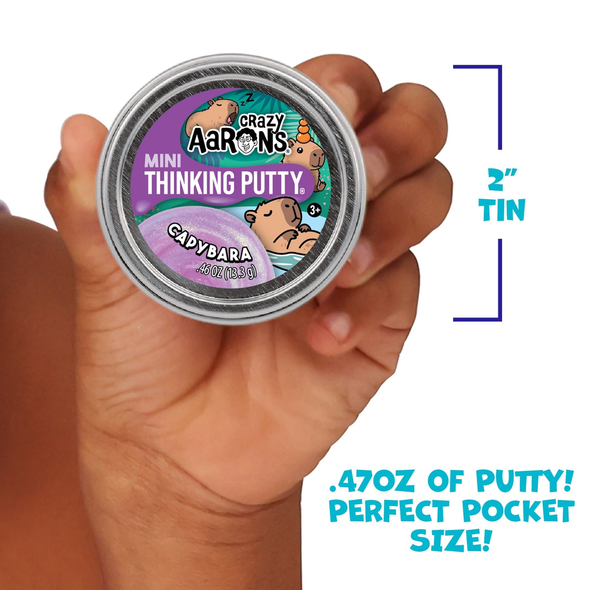 Child holding a Crazy Aaron's Mini Capybara Thinking Putty tin showing its 2-inch pocket size