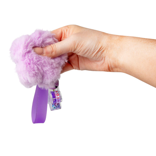 Collage of the fuzzy fidget keychain in Blue Cube, Pink Heart, and Purple Flower styles, held in hand and laid flat