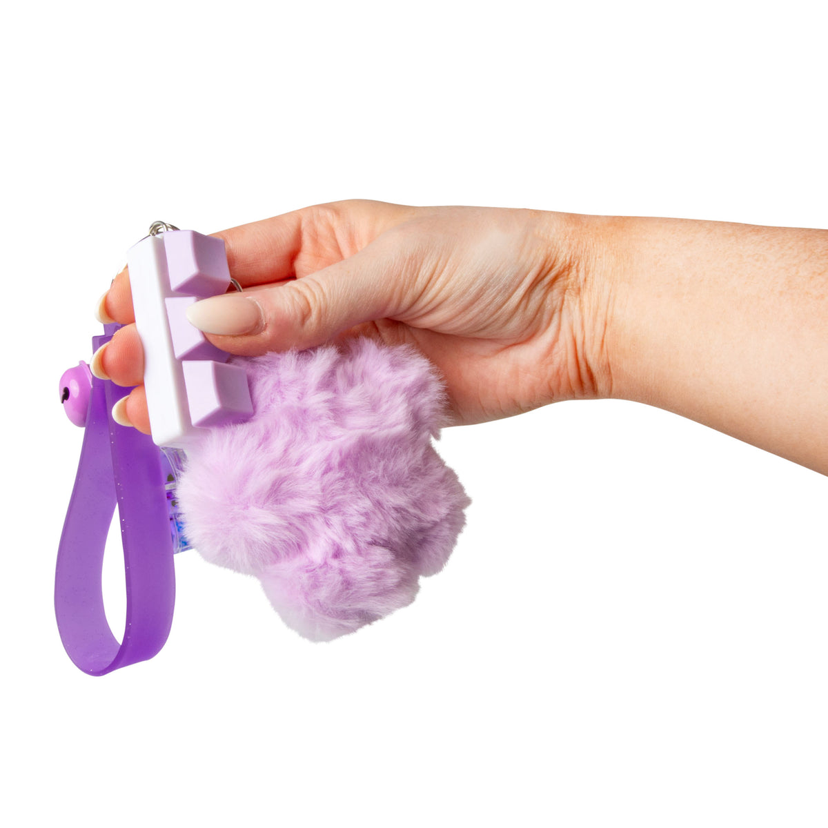 Close-up of a hand holding the glitter cube charm on the Blue Cube fidget keychain