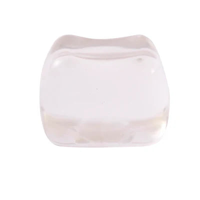 Clear translucent J'adore Fun Cube super squishy sensory toy.