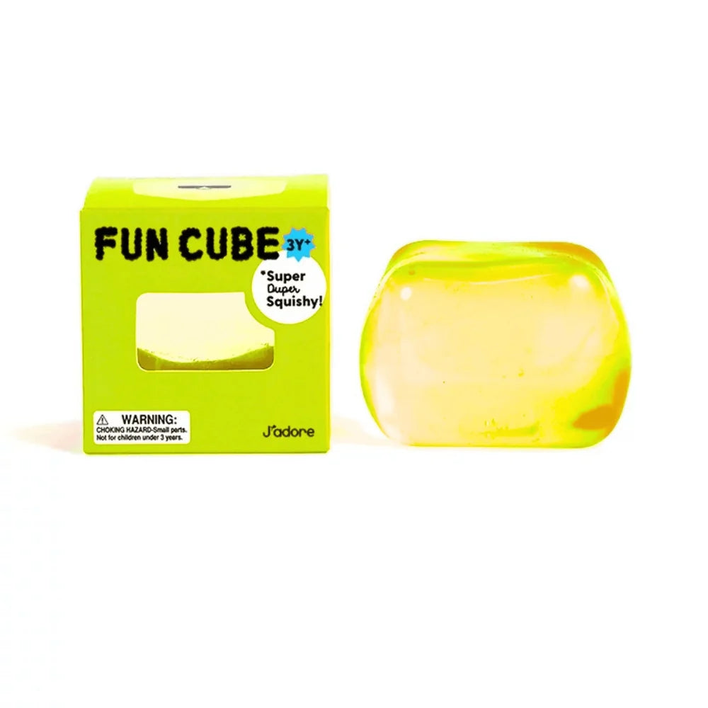 J'adore Fun Cube green box next to the yellow translucent squishy cube