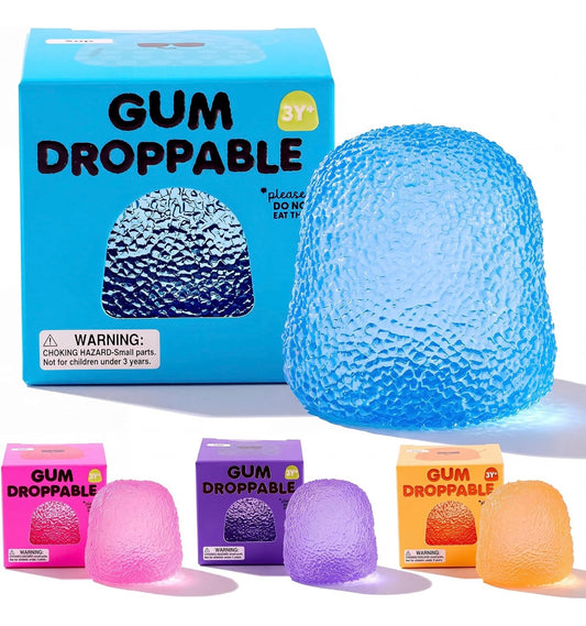 J'adore Gum Droppable blue box next to a large blue gumdrop squishy, with smaller boxes and squishies in pink, purple, and orange