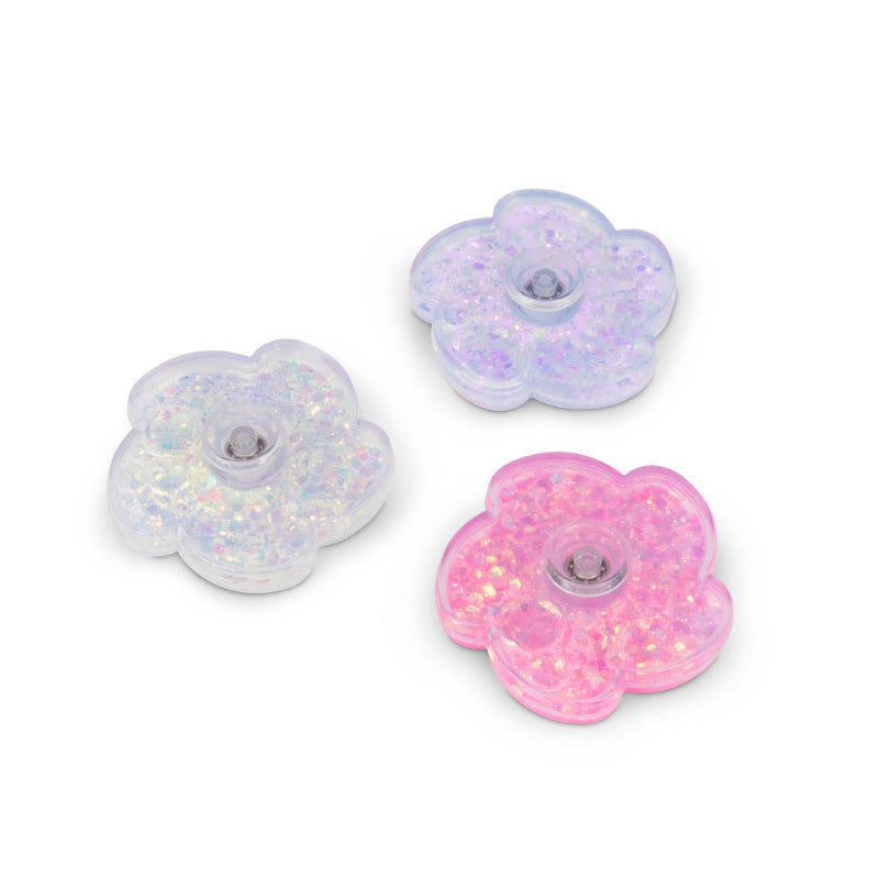 Hand holding the white iridescent Liquid Glitter Fidget Spinner