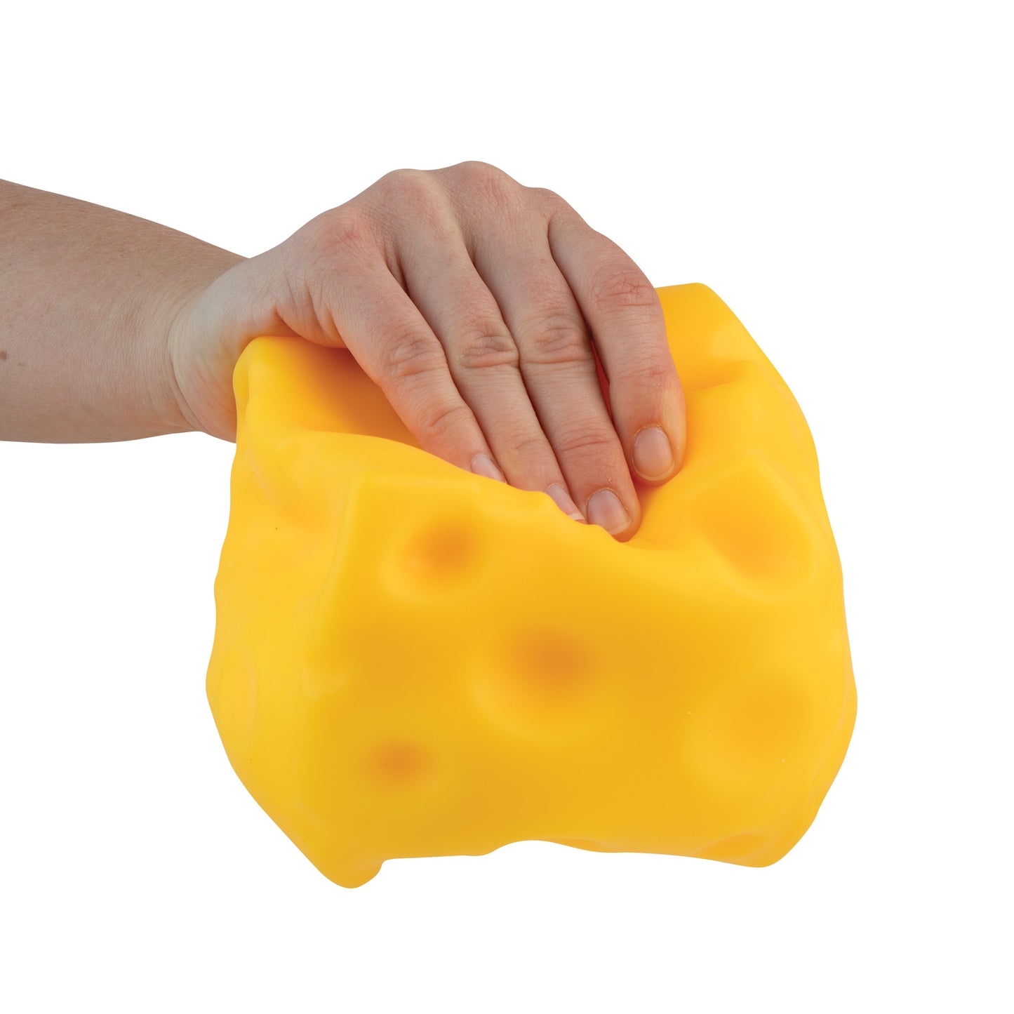 Hand pressing the oversized Easy Sqweezy Super Cheesy squishy to demonstrate its soft texture.