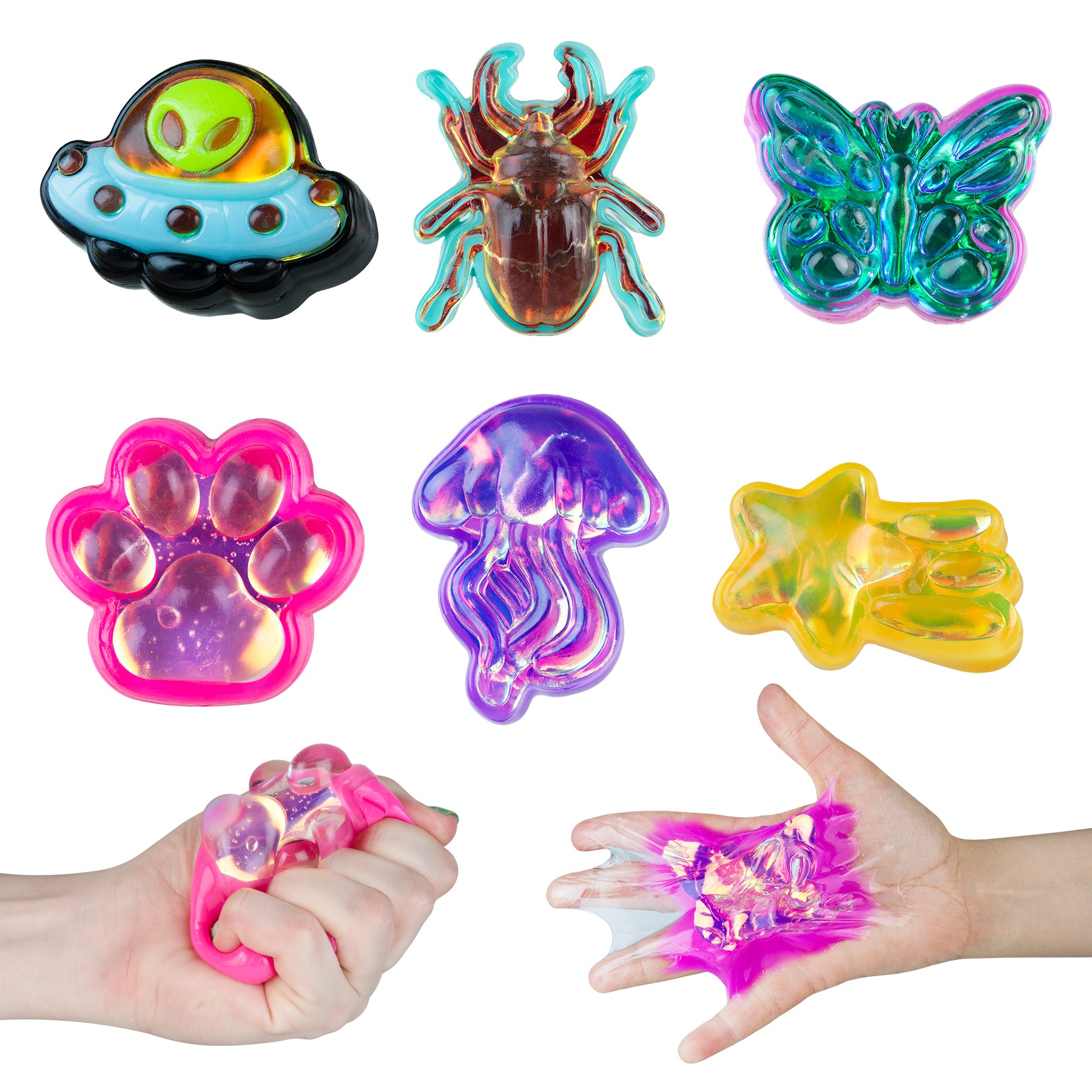 Assorted holographic Taba-licious squishy toy designs including UFO, butterfly, beetle, jellyfish, paw print, and shooting star.