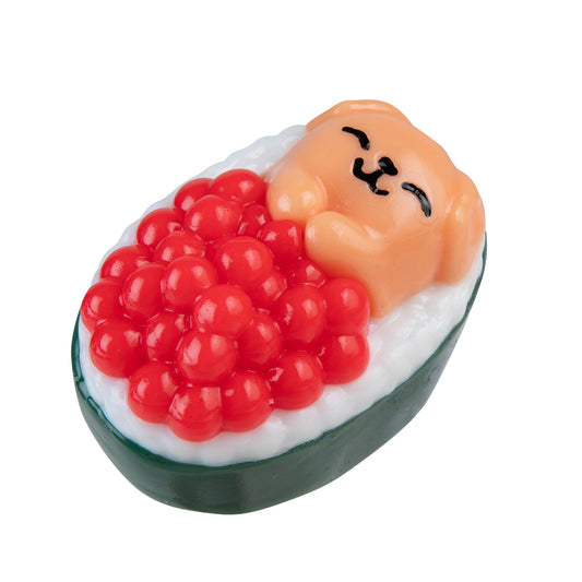 Side view of a Taba-licious Snackies sushi roll squishy with smiling character details.