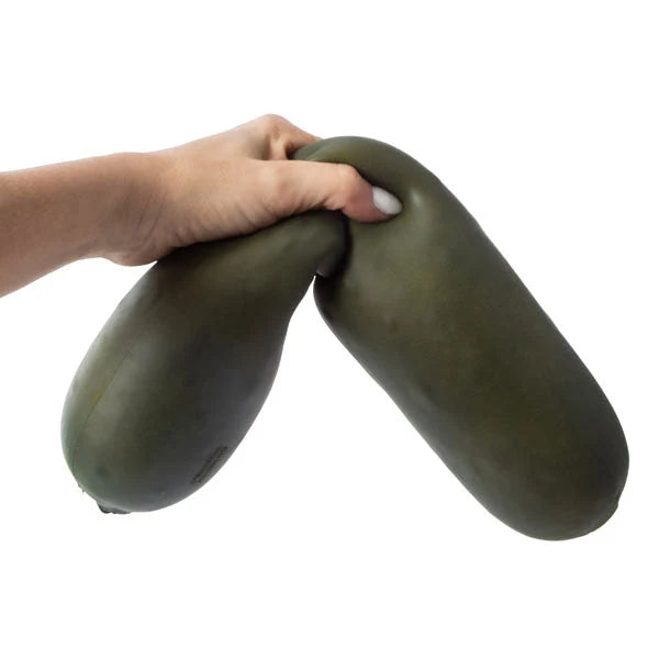 RMS SmushMart Giant 15 inch Pickle Squishy Fidget Toy being squeezed