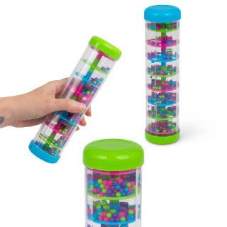 Hand holding the Sensory Rainmaker with green cap and blue base, tilted to show beads falling