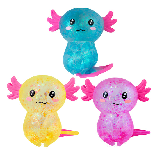 Three glittery Sugar Swaps axolotl squishies in blue, yellow, and pink with pink fins and tails