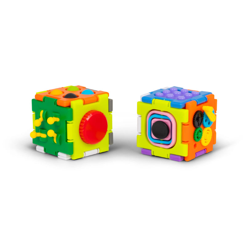 Two Super Sensory Square fidget cubes side by side showing gears, dials, and click switches