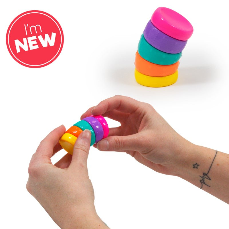 New arrival Torsion Rainbow Circle fidget toy shown stacked and held in hand