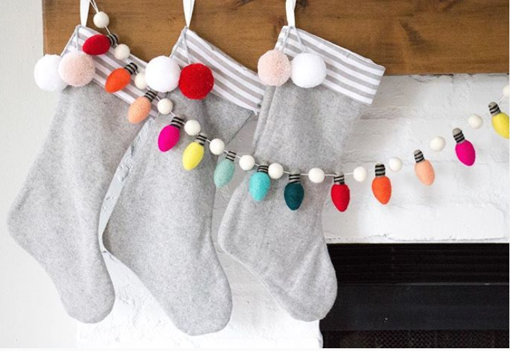 Joy Felts Christmas lights garland made of wool felt balls in holiday colors
